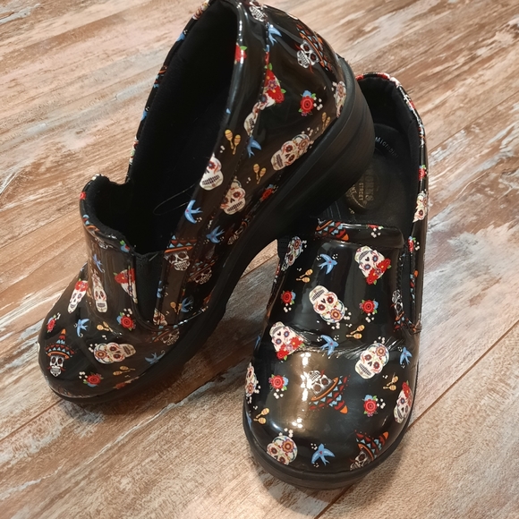 skull nursing clogs